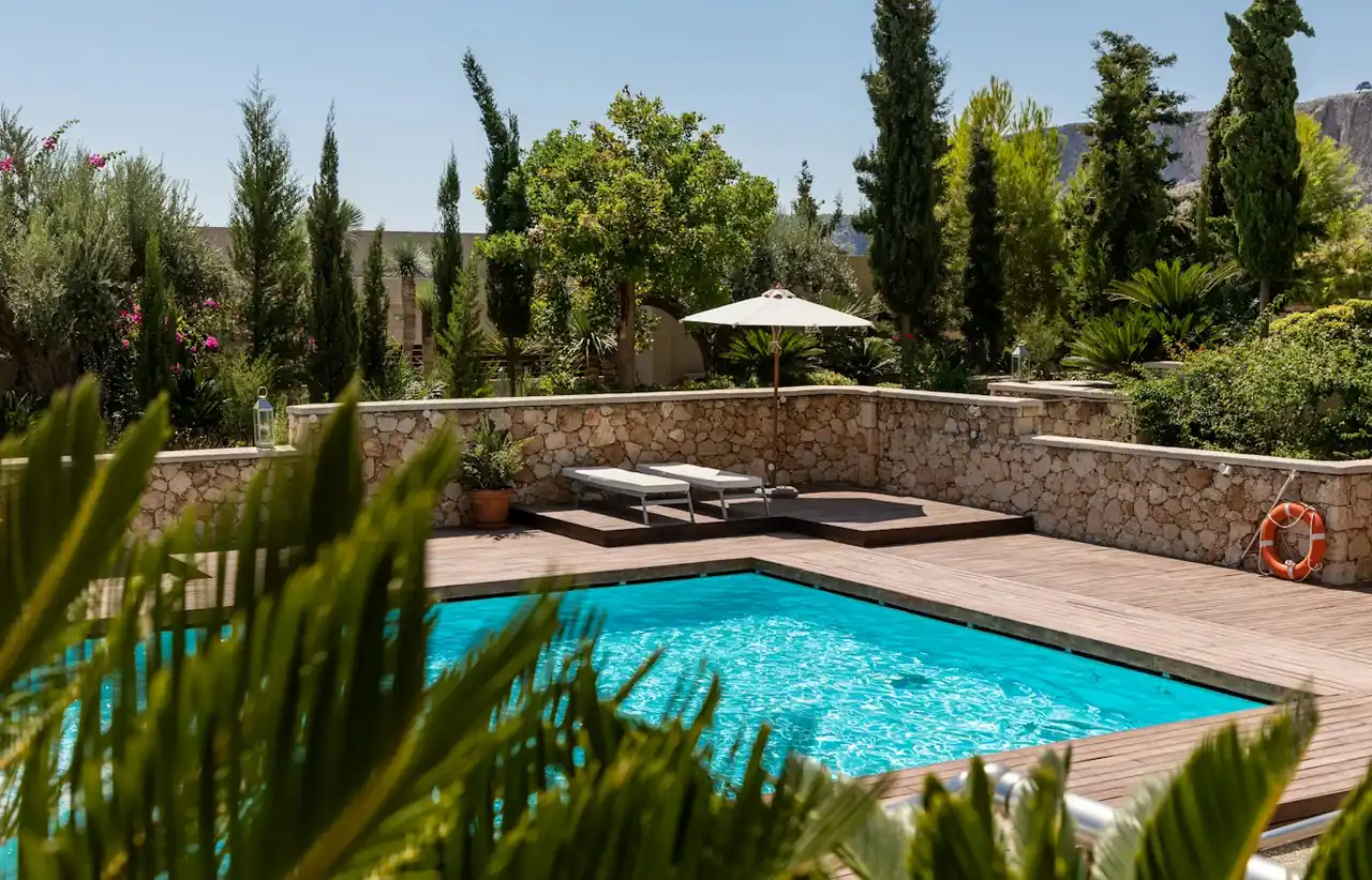Residential swimming pool with clear water on a sunny day